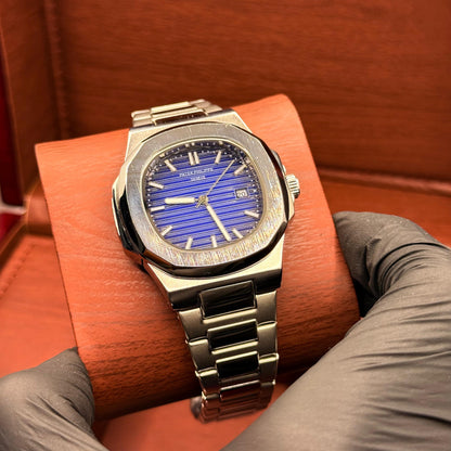 pp silver with blue  dial with date