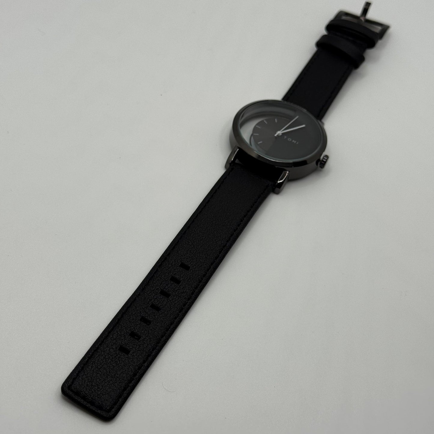 TOMI transparent dial with black leather strap