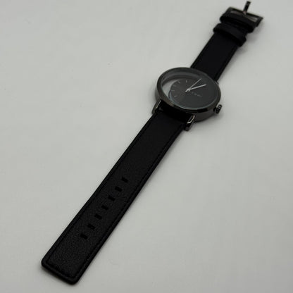 TOMI transparent dial with black leather strap