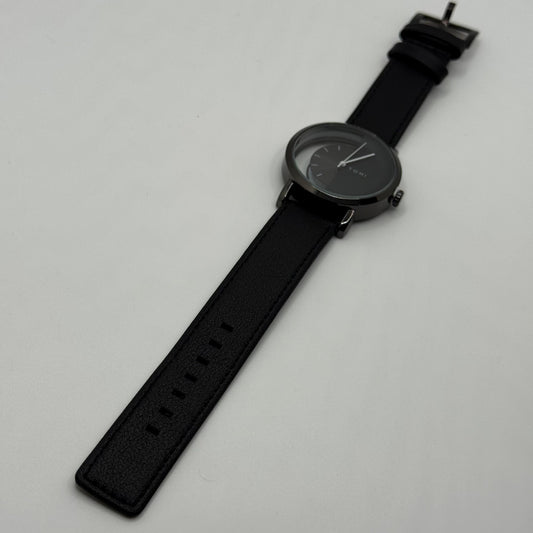 TOMI transparent dial with black leather strap